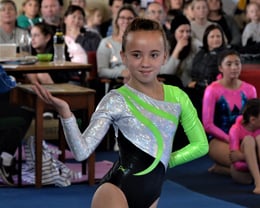 Breanna competing on Floor at the St Bernadette