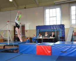 Zoe competing vault at the St Bernadette