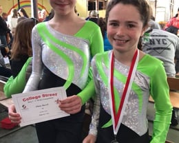 Olivia & Alia receiving their certificates at the College Street Competition